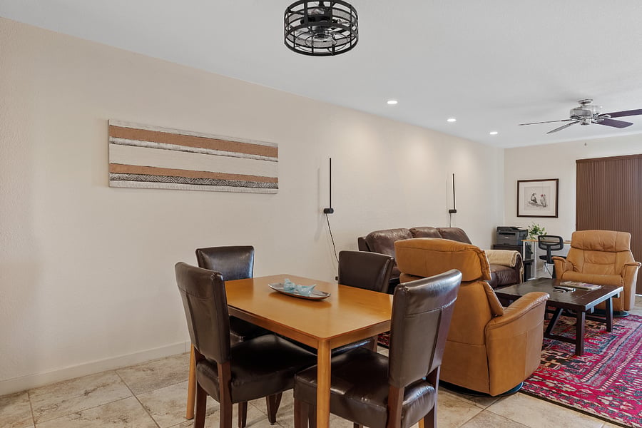 Bright dining area with comfortable seating for four.