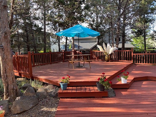 Large deck has lots of shaded area and sitting spaces.