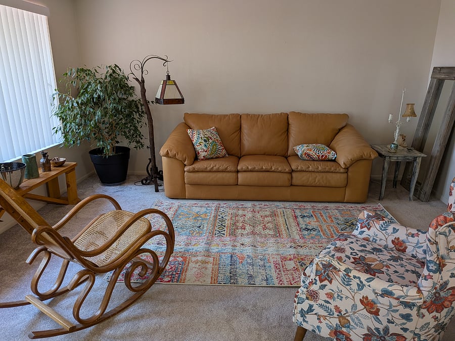 Shared Living room with access to large back deck and quiet back yardBedroom double l=closet