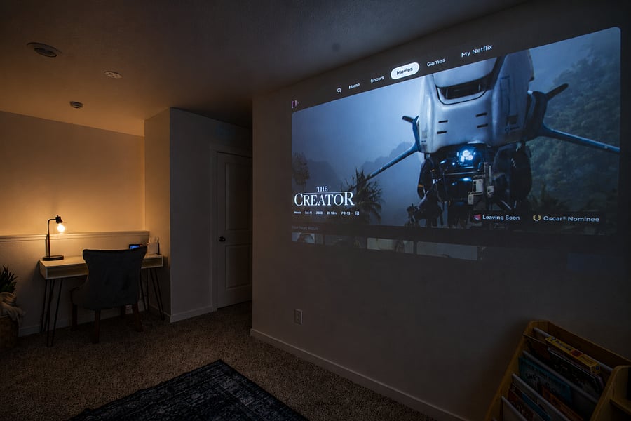 Upstairs livingroom cinema with projector and workspace