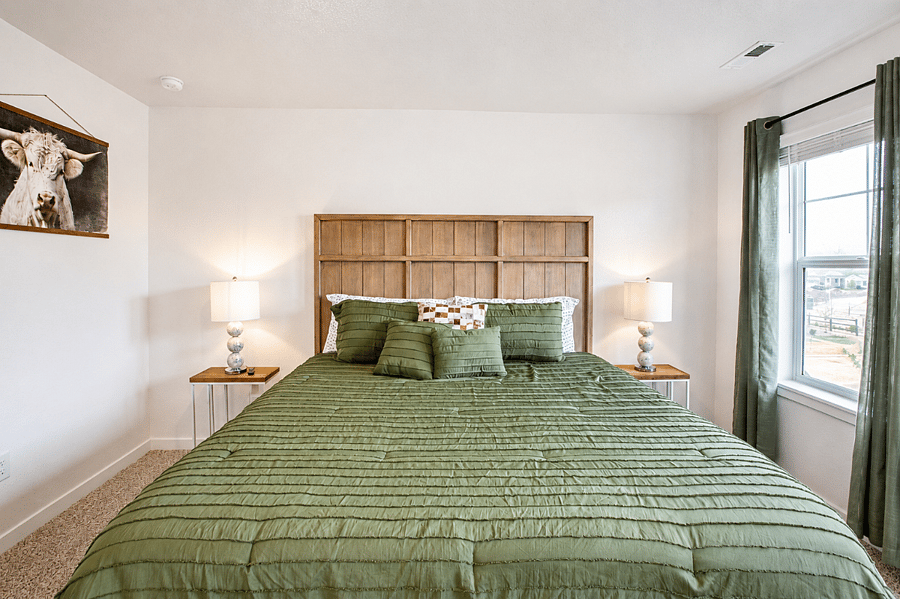 Master bedroom with king size bed and smart tv