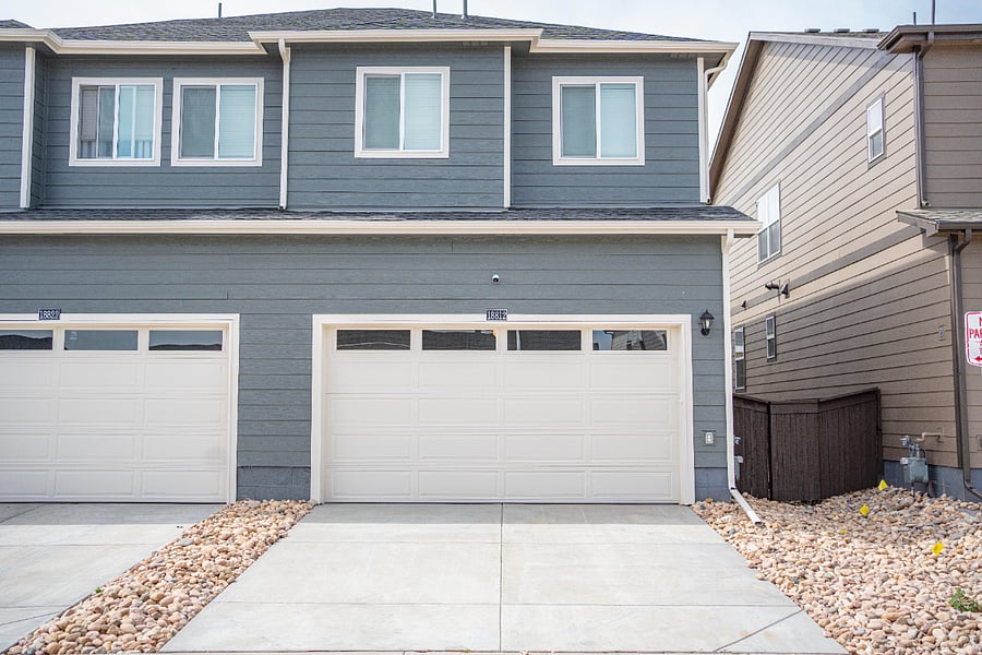 Back entrance, garage with two spots + 2 spots on the driveway