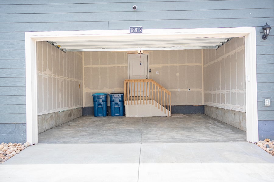 Back entrance, garage with two spots + 2 spots on the driveway
