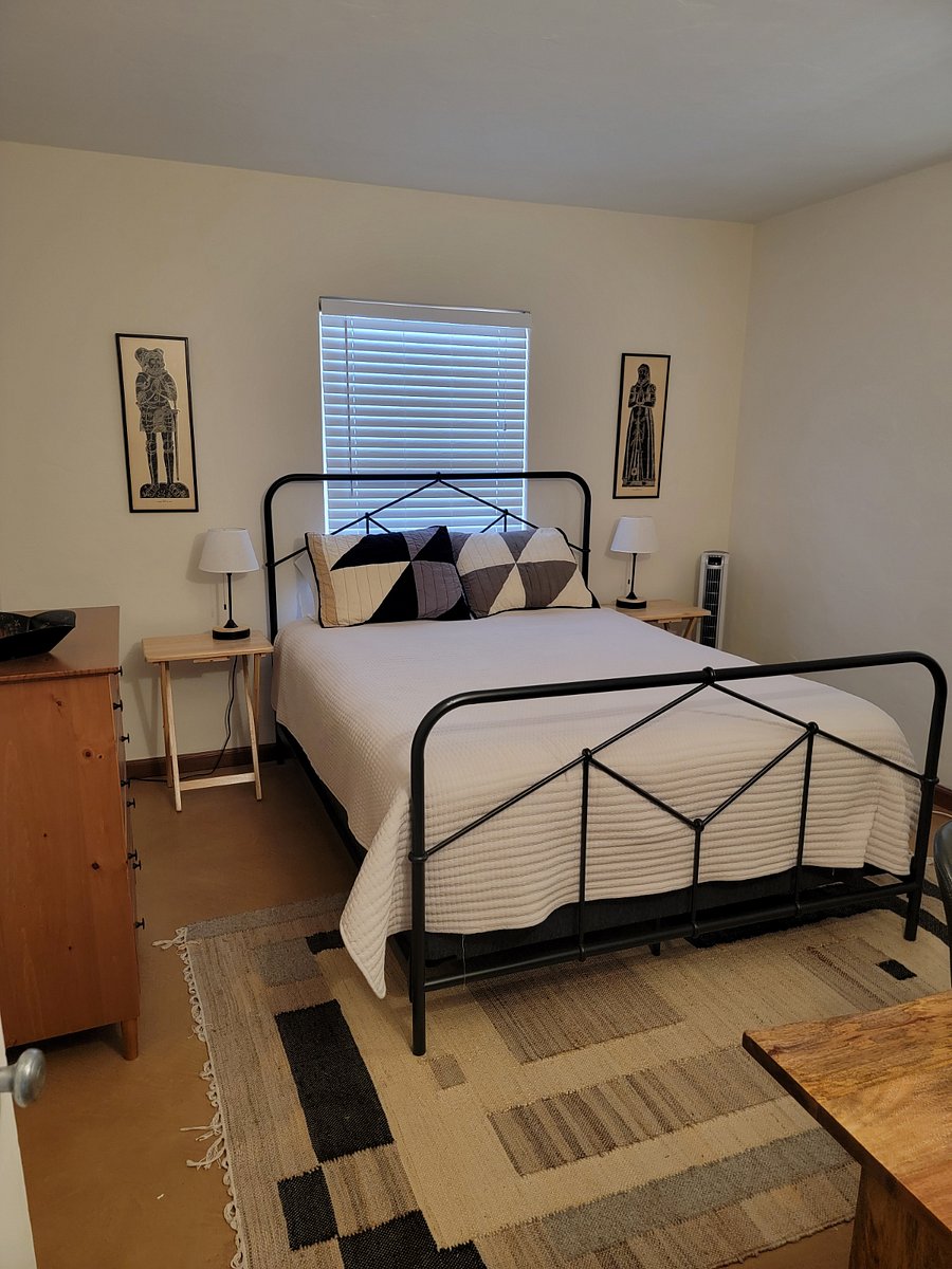 Queen sized bed with new memory foam mattress, computer desk and walk in closet.