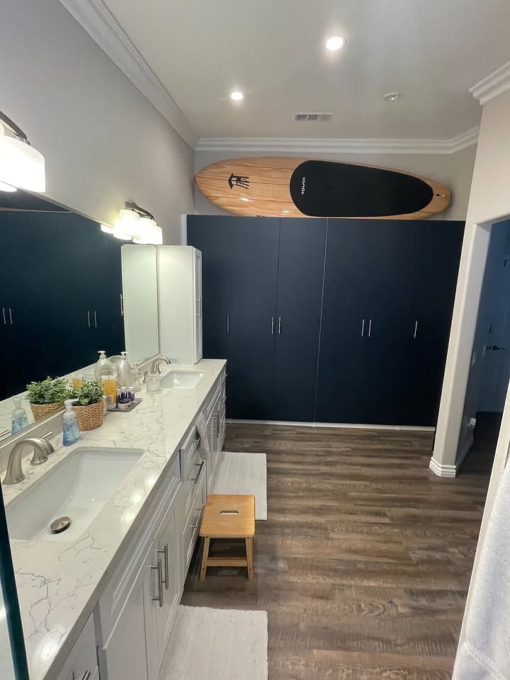 Primary suite bathroom, closet and storage 