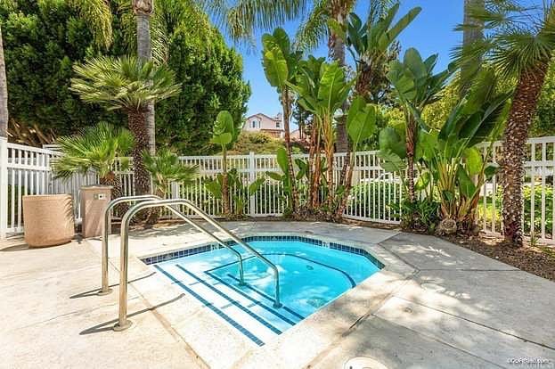 Hot tub in complex just steps away from your door 