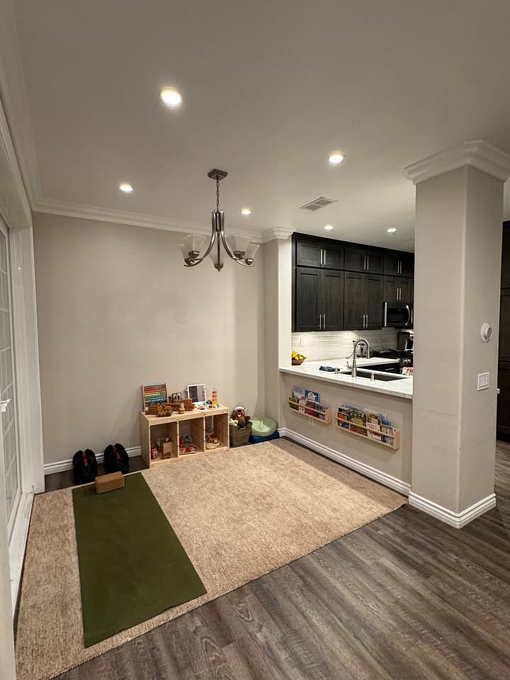 Multifunctional room that opens to a bright back patio