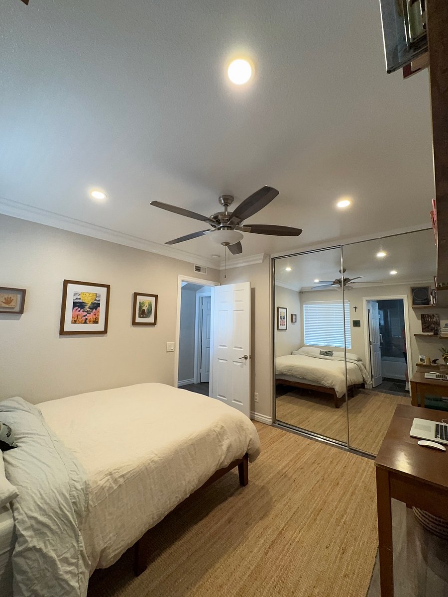 Junior suite, spacious queen bed, storage, dedicated working space, and private bathroom!