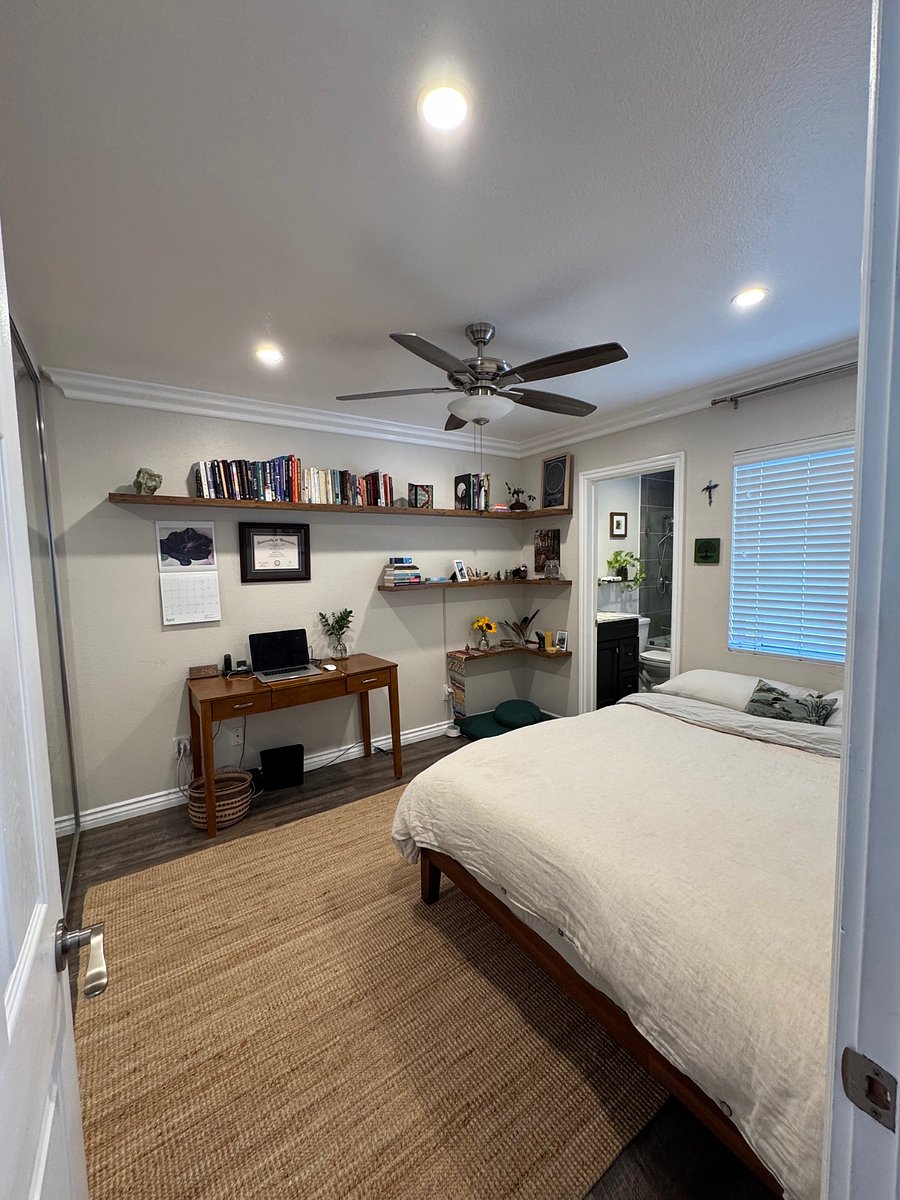 Junior suite, spacious queen bed, storage, dedicated working space, and private bathroom!