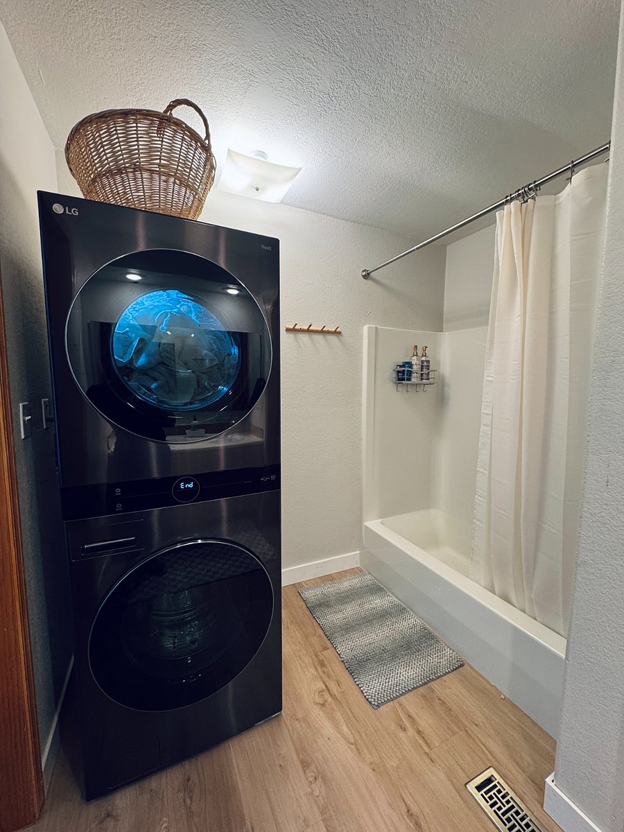 Primary bath with new laundry.
