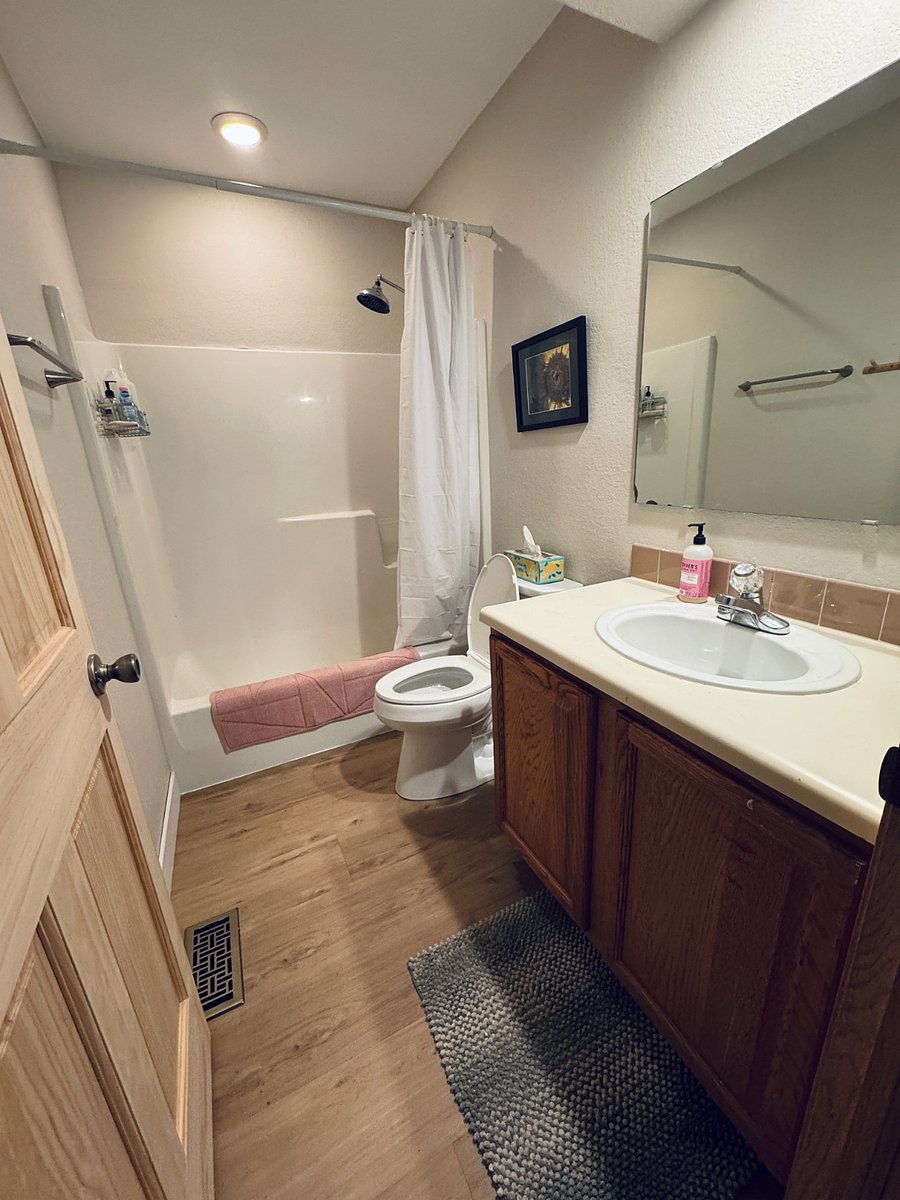 Second bathroom from main hallway.