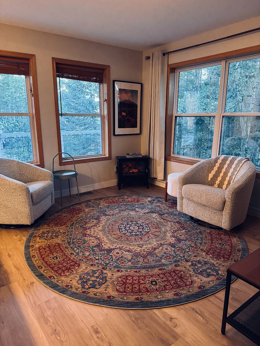 Cozy electric fireplace in living room.