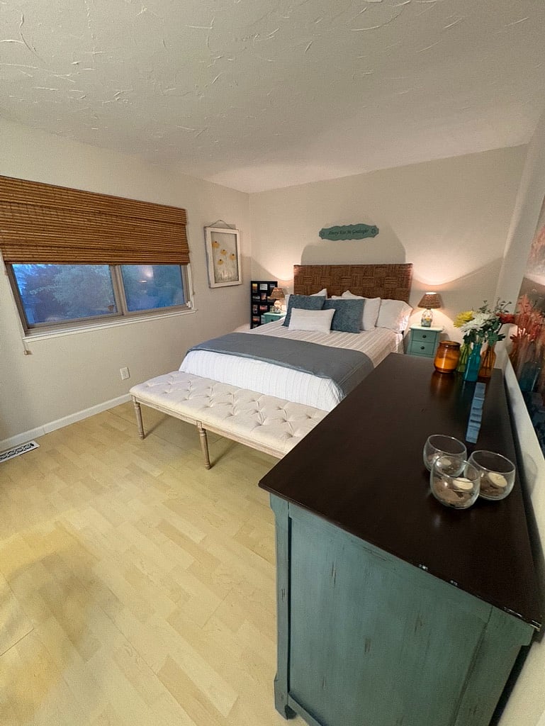 Queen size bed (sleeps 2), 2 nightstands, full dresser, full length mirror, changing bench, clothes rack