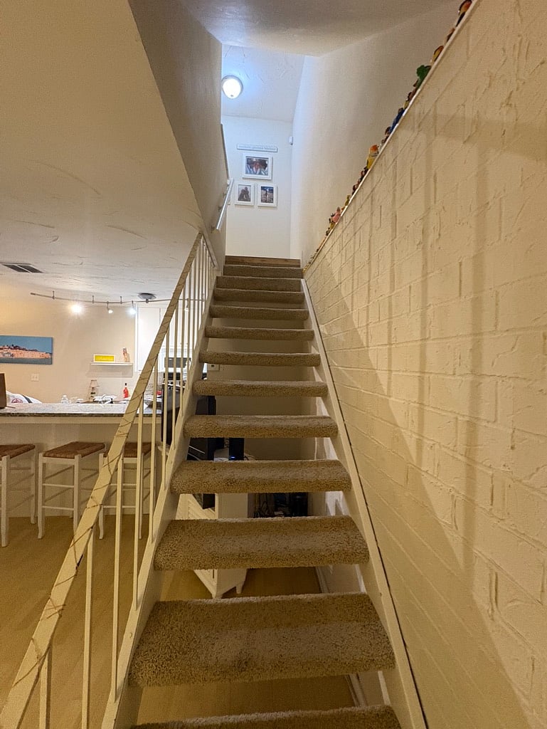 Stairs to second floor creating a nice living and sleeping space separation
