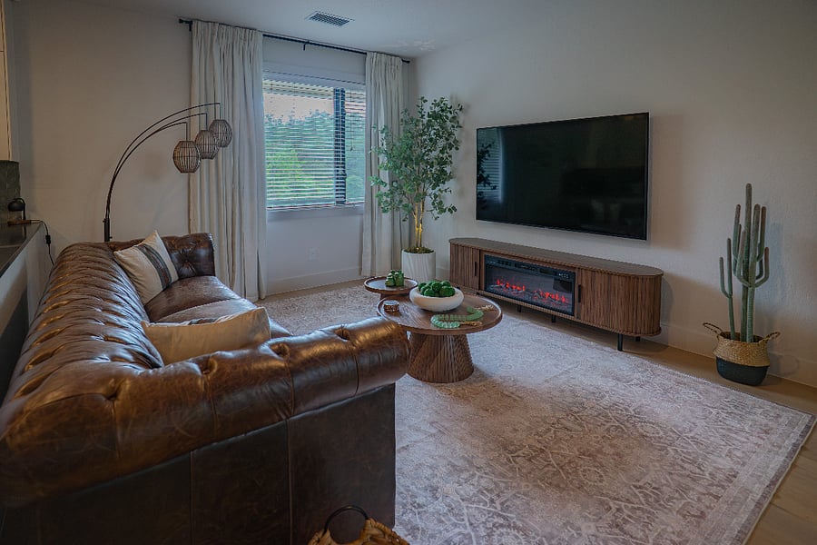Living Room - Leather Couch with Fireplace