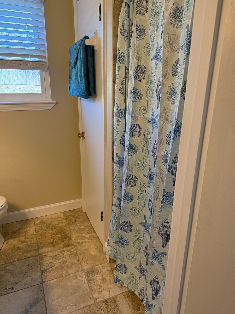 Spacious Shower and extra clothes closet