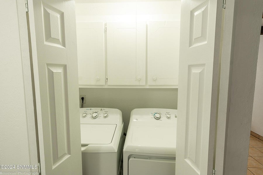 Hallway laundry/iron board/lining closet