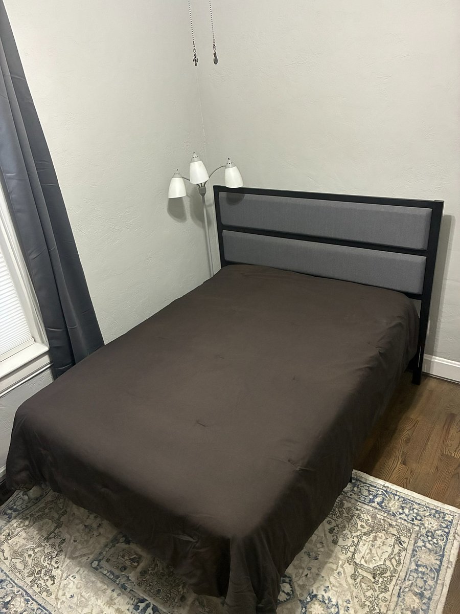 2nd Bedroom includes full bed, dresser, and 50" smart TV.