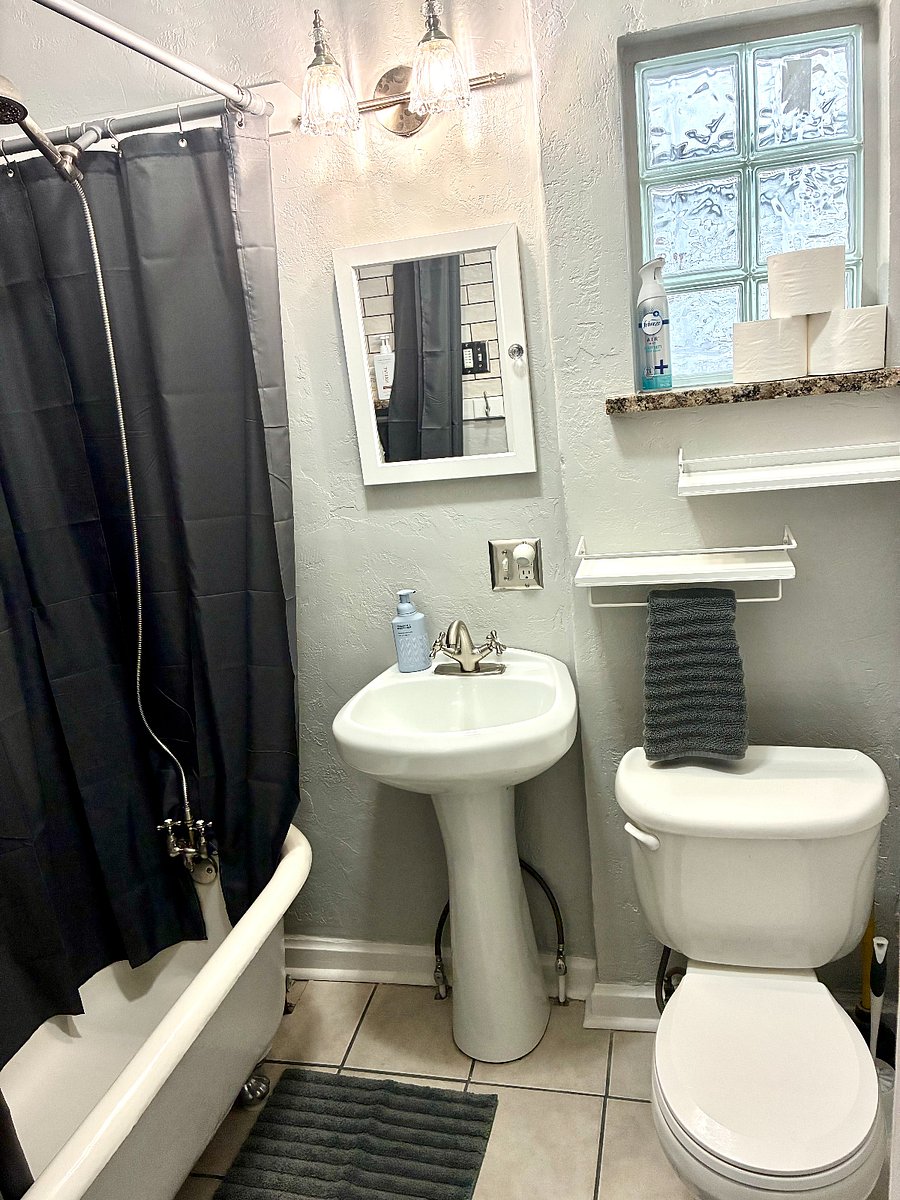 Bathroom with clawfoot tub.