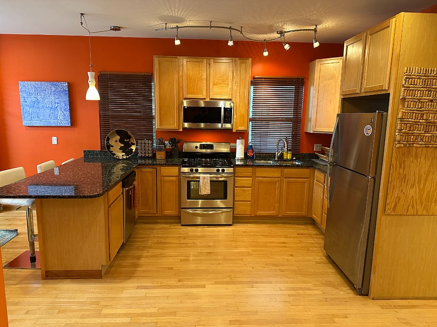 Fully equipped kitchen with full-size appliances and generous workspace, making longer stays much more comfortable than a hotel.