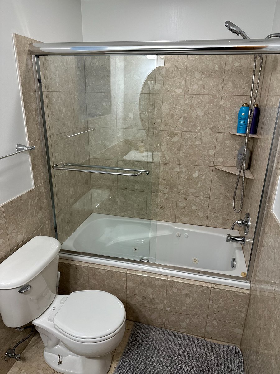 Full bathroom with tub/shower combination especially useful for families, or guests who prefer a soaking option.