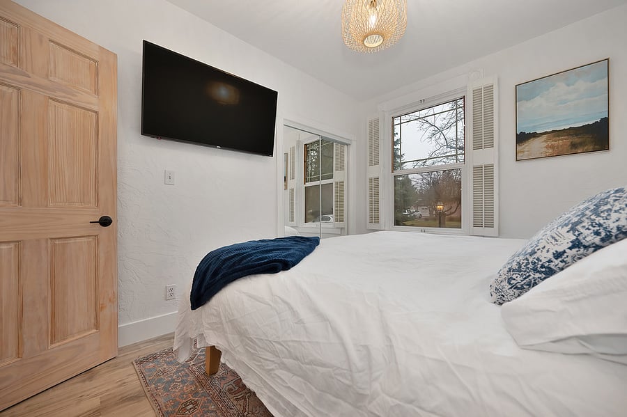 King Bed and Smart TV in primary bedroom on first floor.