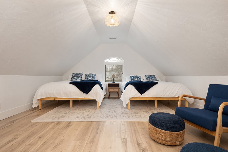 Two Queen Beds and large sitting area with Smart TV