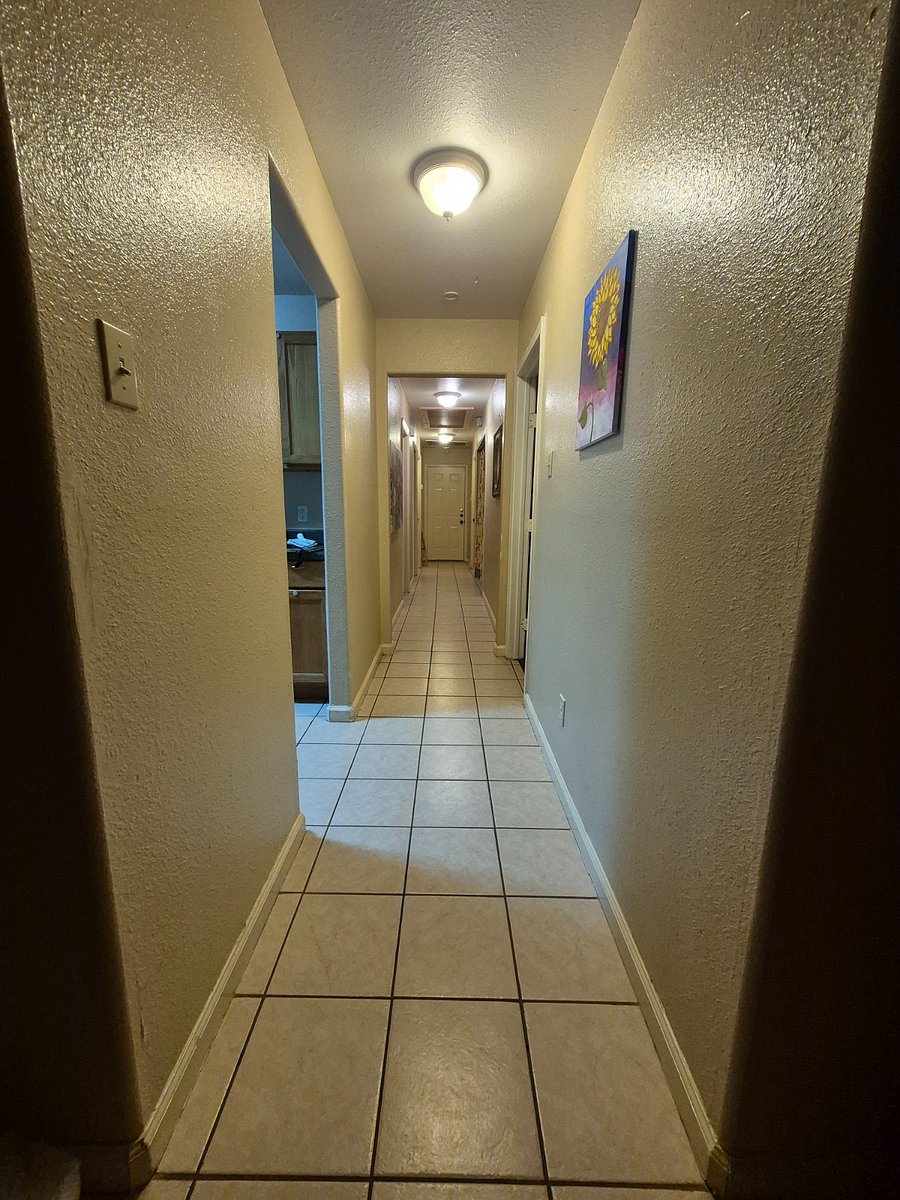 EXTENDED HALLWAY, LEADS TO THE PRIVATE BATH AND LAUNDRY 