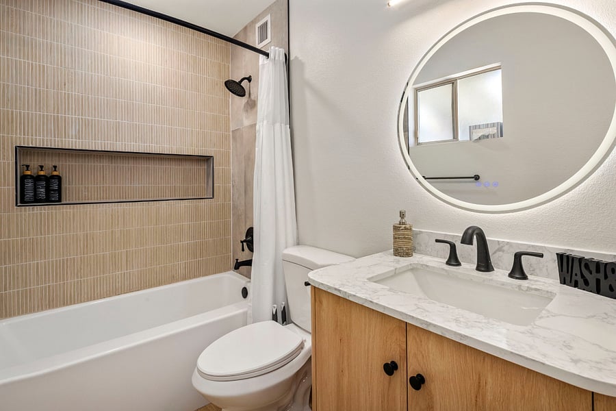 Centrally Located Elegance: This beautifully reimagined third bathroom is perfectly positioned between the Garden Room and the Office. It offers a clean, modern aesthetic and designer fixtures.
