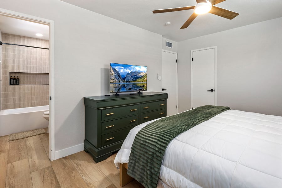 This private en-suite has been thoughtfully updated with high-end finishes and designer fixtures. A tranquil, quiet space tucked away from the main social areas