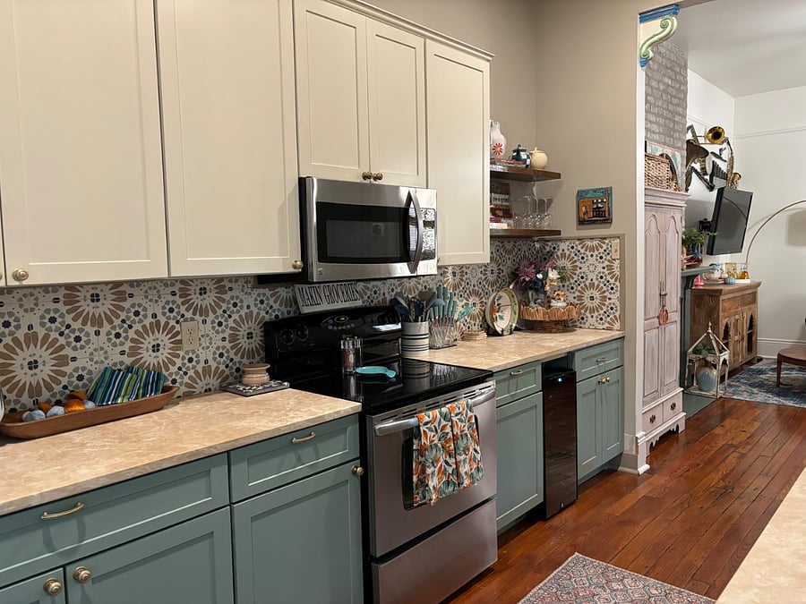 Galley kitchen with washer/dryer.