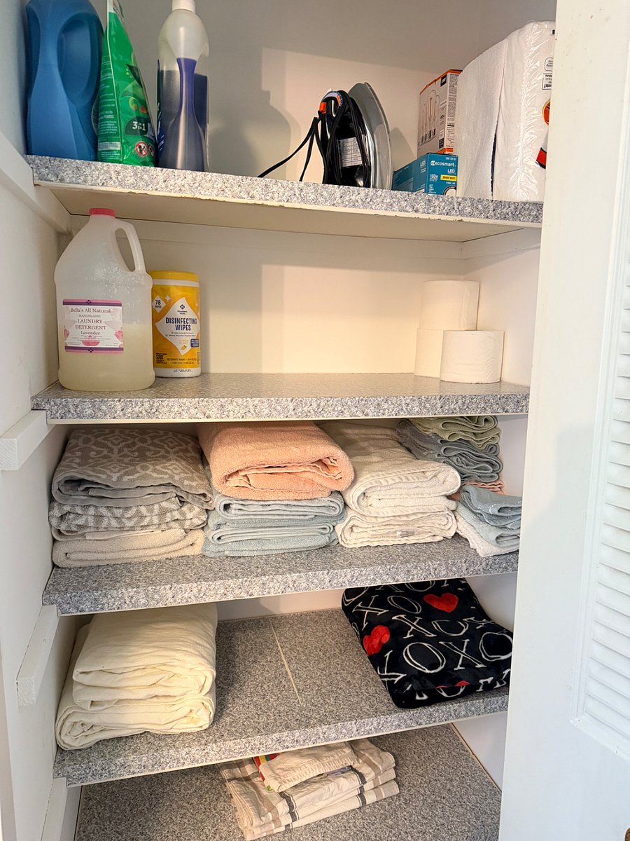 Plenty of towels and laundry supplies, iron, and full size ironing board.