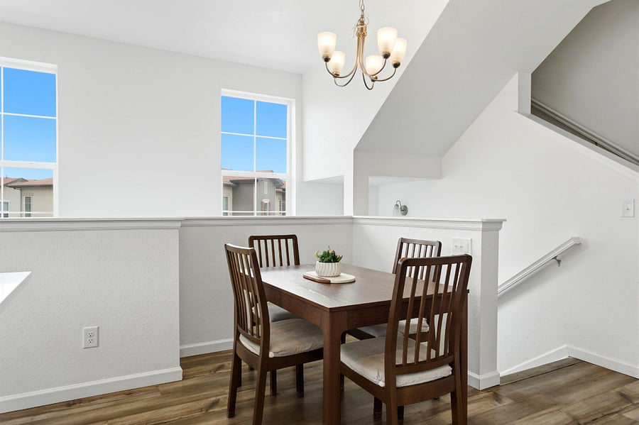 Dining table can be easily expanded up to 8 seats (with extra chairs stored in garage).