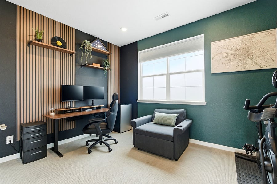 Incredible designed Office or gaming room comes equipped with standing desk, PS5, Smart TV, dual monitors and pull-out chair for ultimate relaxation.