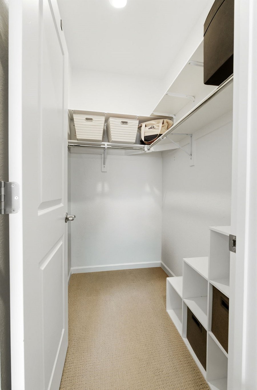 Great sized Master walk-in closet with extra storage spaces.