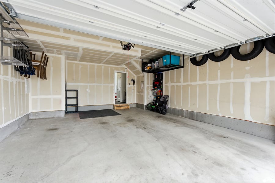 Oversized 2 car garage with extra storage space available. (also includes punching bag in bump out section)