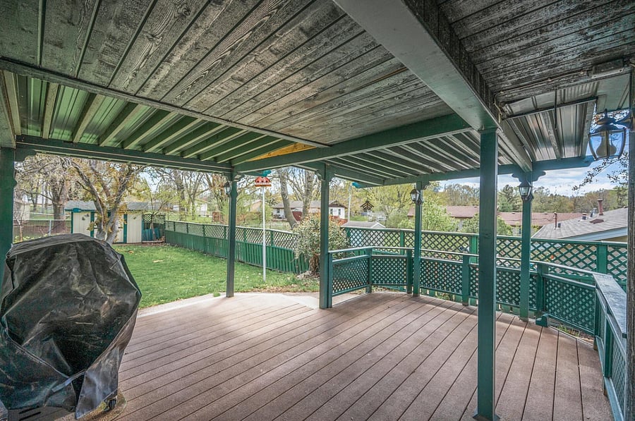 Covered backyard porch.