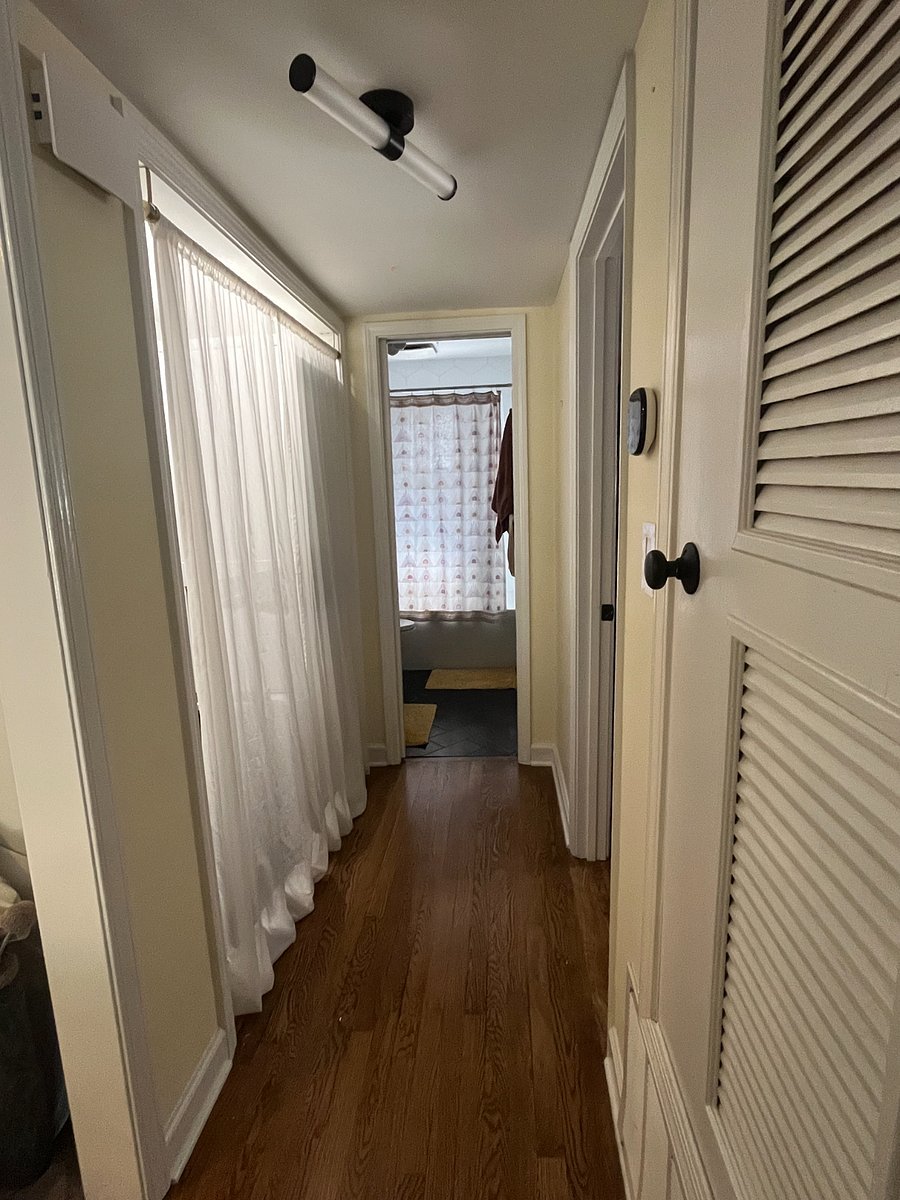 Hallway from living room to bedrooms and bathroom