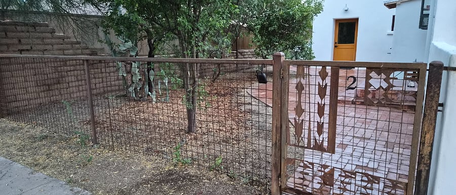 front gate and wide view of the patio
