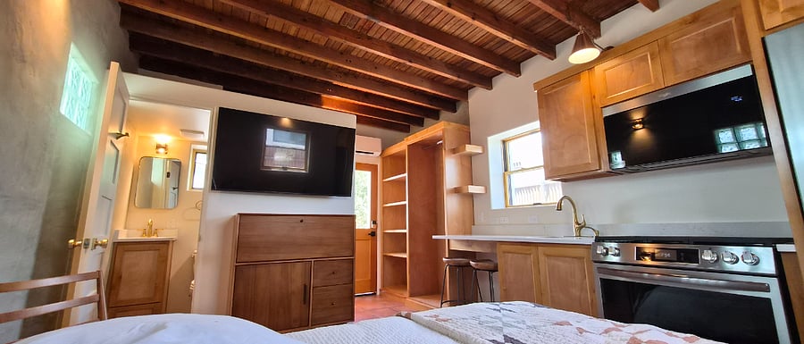 55" smart TV, chef's kitchen, original rough-sawn rafters and Douglas fir tongue and groove celiing