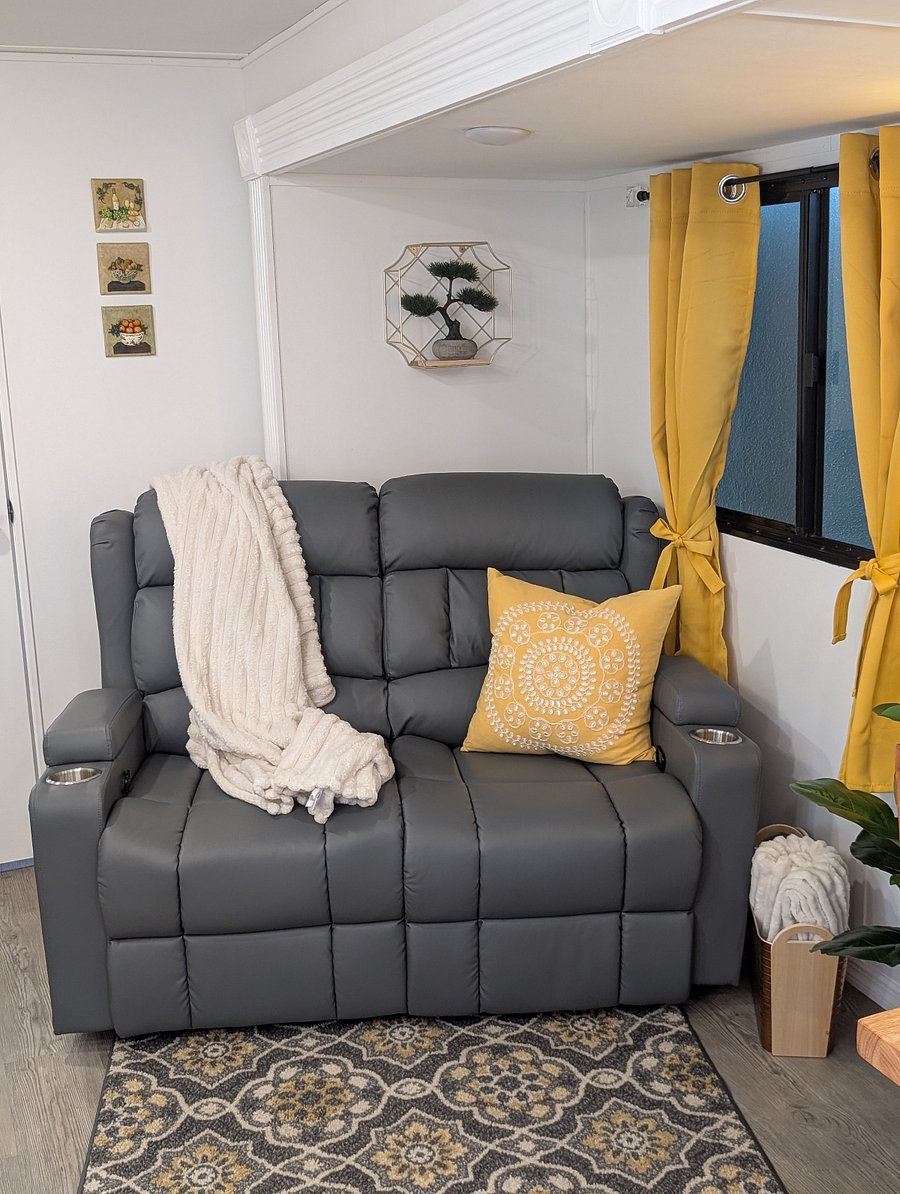 Enjoy the reclining loveseat after a day of exploring, complete with convenient USB charging ports on each side to keep your devices powered. The GG team has added extra power strips for more convenience.