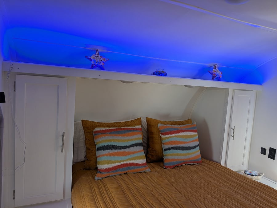 Our goal is to make your RV adventure a comfortable and relaxing experience. The bedroom features a very comfortable queen-size mattress dressed in soft linens and plush pillows.