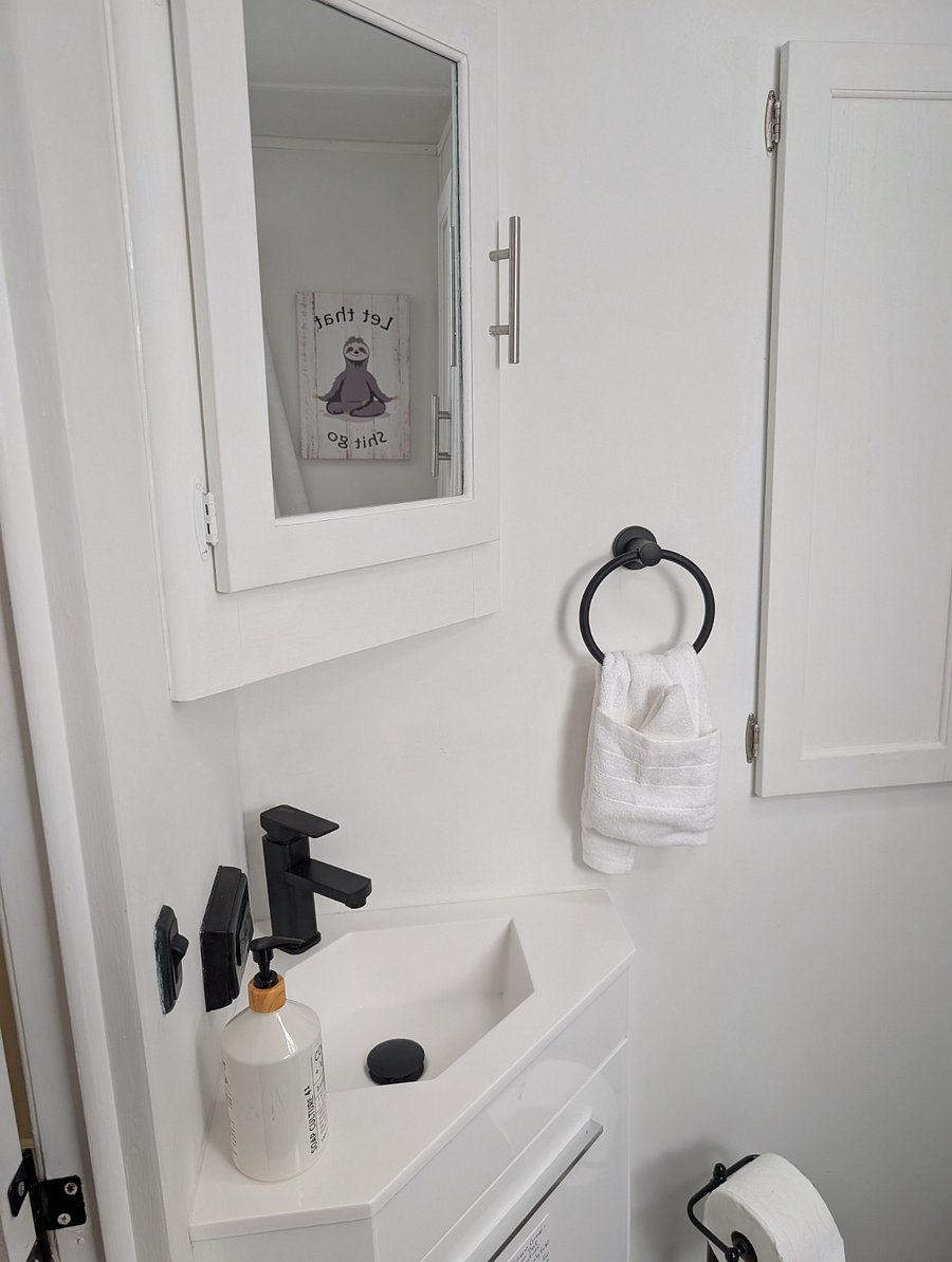The sink in the bathroom is completely operational and quite charming.