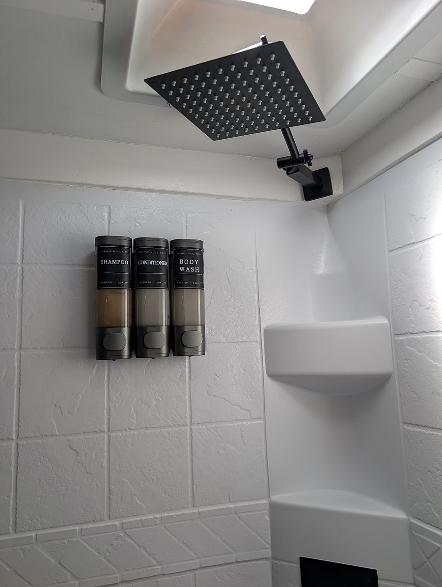 A skylight above the shower brings in natural light, giving you the feeling of showering outdoors while still enjoying the comfort of being inside. We also provide high-quality body soap, shampoo, and conditioner for your convenience.