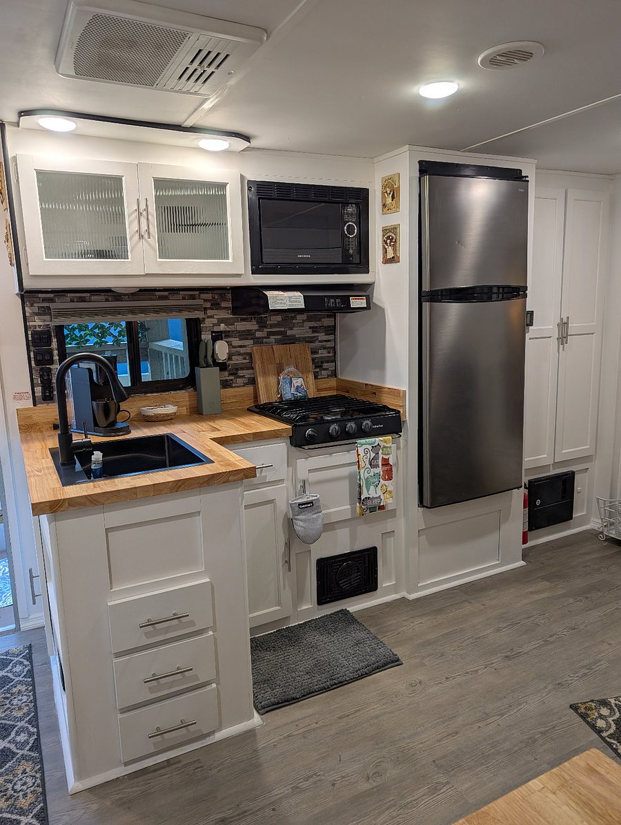 Enjoy your time and experience the adventure of RV cooking with our fully equipped kitchen. Checkout the gorgeous butcher block!