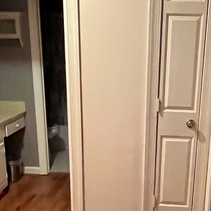 Upstairs hallway. Full bath outside of bedroom. 