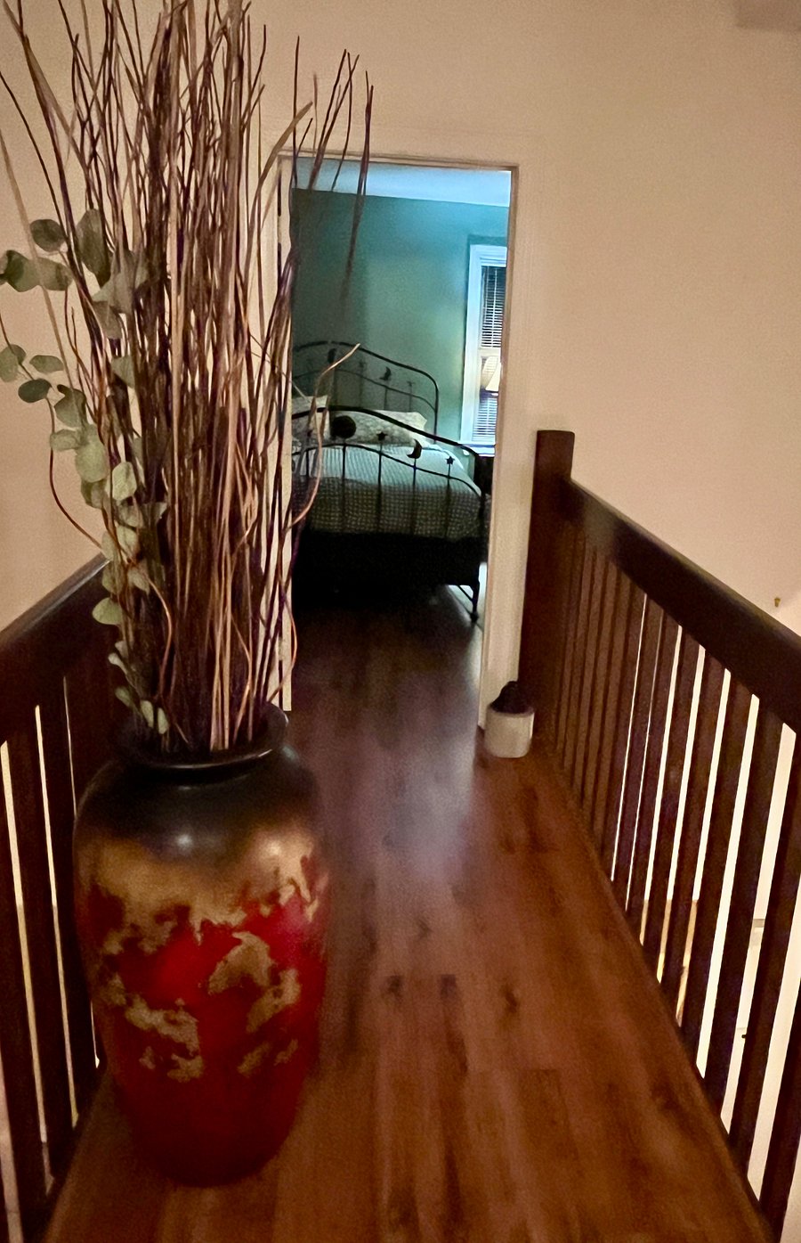 Upstairs hallway leads to 2nd bedroom.