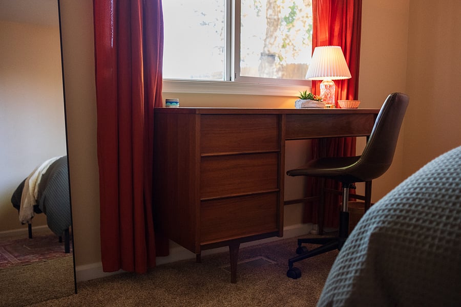Dedicated workspace with comfortable chair and ample storage