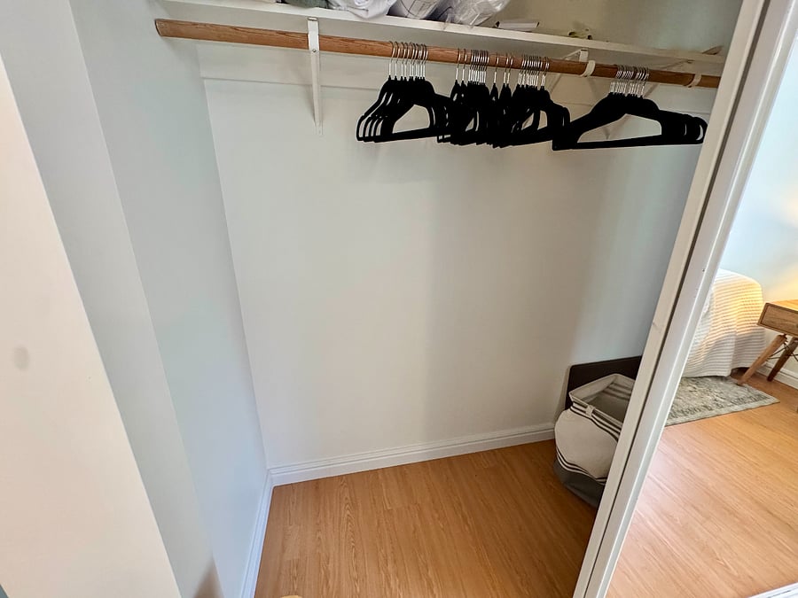 Real closet with 25+ velvet hangers, dresser, and luggage space. Built for a 30-day stay.