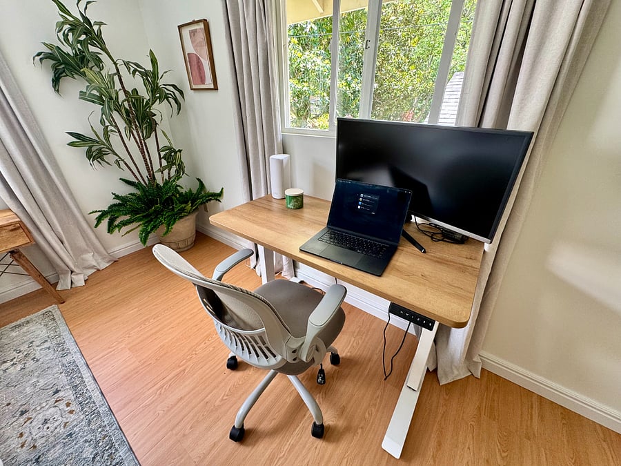 Electric standing desk, ultrawide monitor, ergonomic mesh chair. Built for telehealth, charting, and remote work.